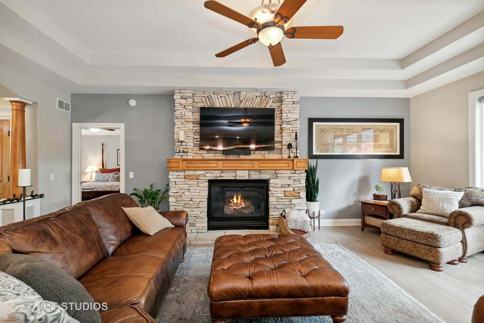 8902 Voss Road Marengo, IL 60152 - Photo 7 of 35 a living room with furniture and a fireplace