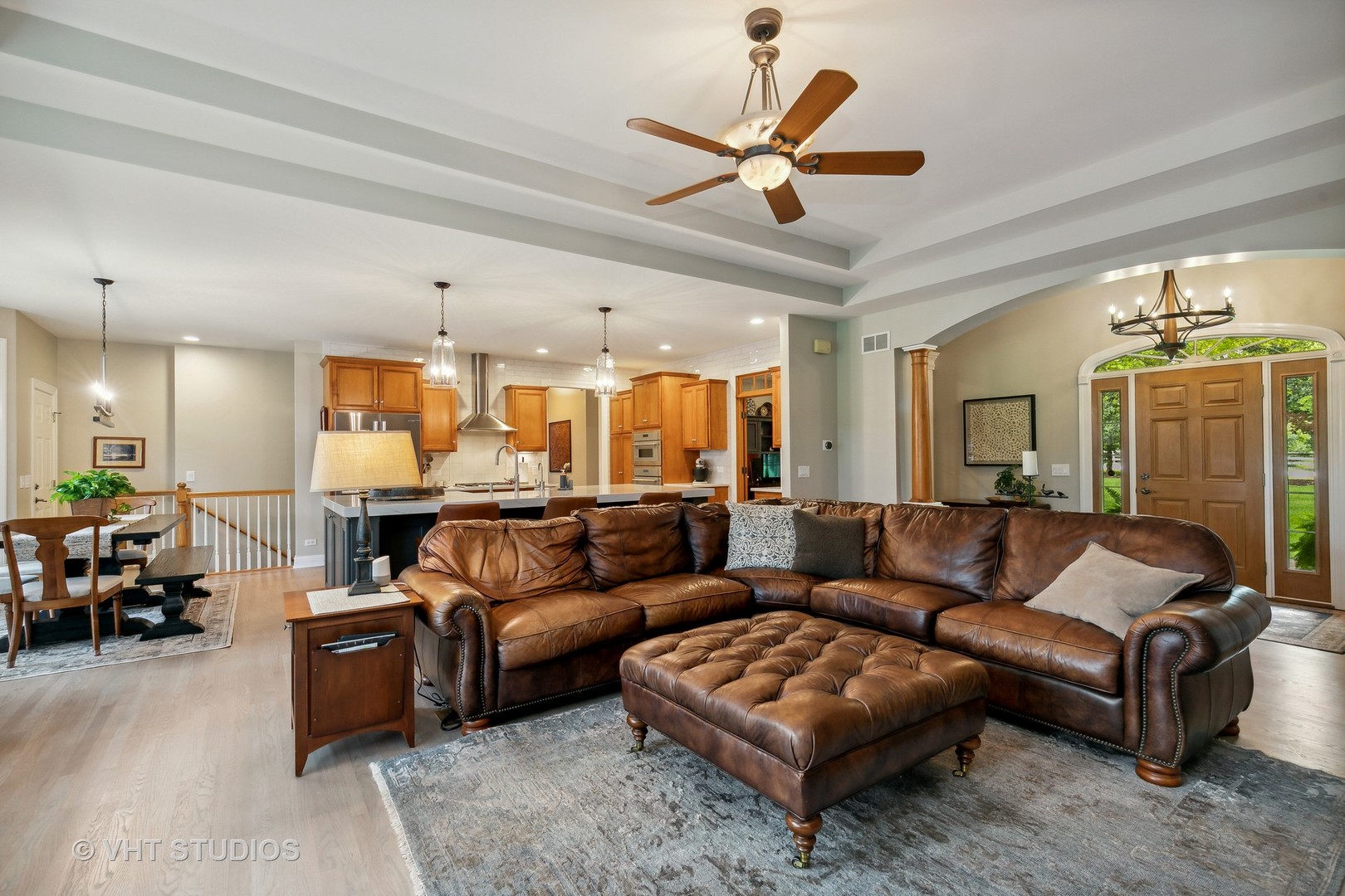 8902 Voss Road Marengo, IL 60152 - Photo 9 of 35 a living room with furniture ceiling fan and a rug