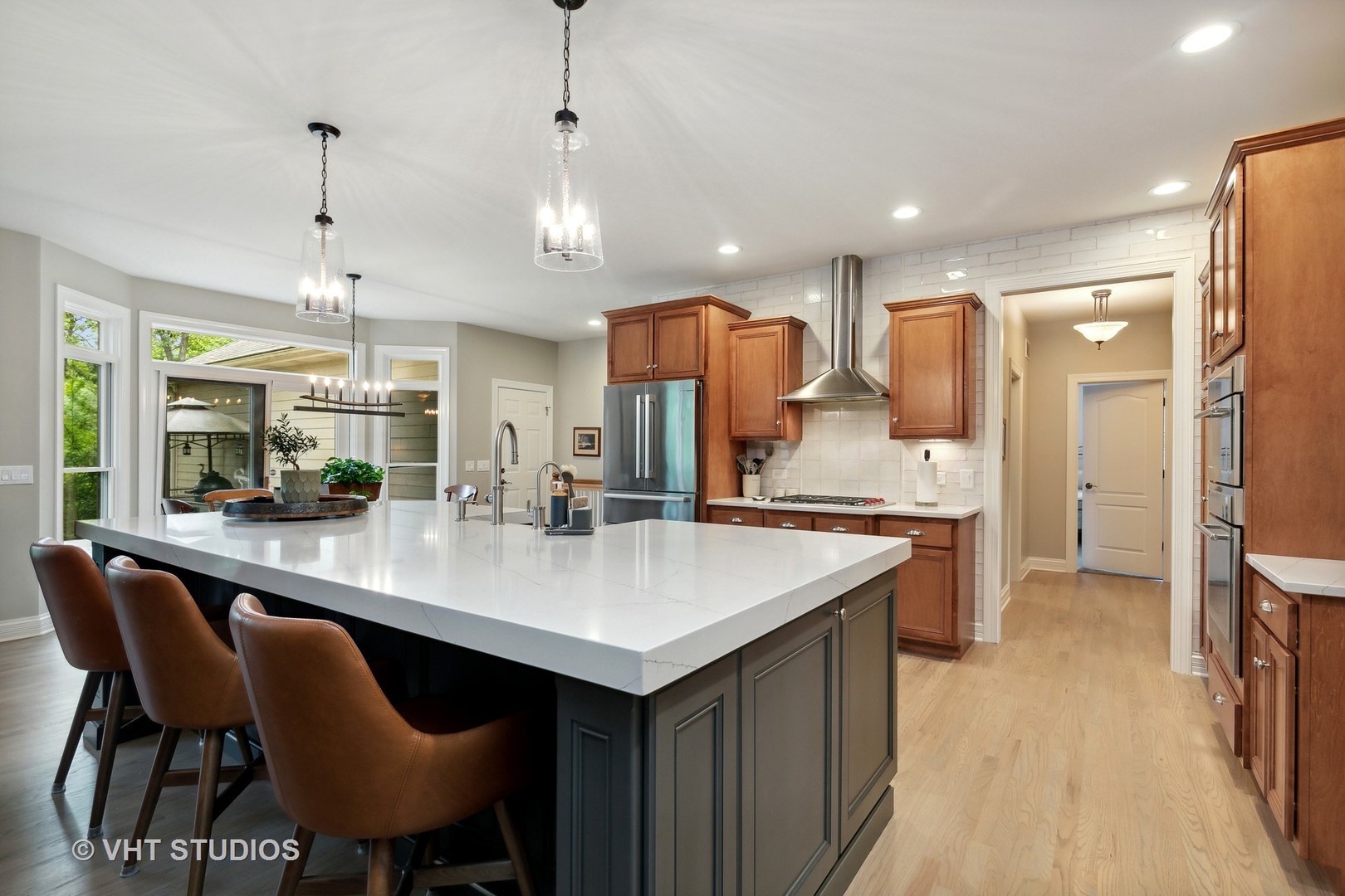 8902 Voss Road Marengo, IL 60152 - Photo 10 of 35 a large kitchen with a table and chairs
