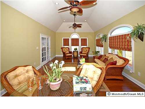 153 Paint Island Spring Road Millstone Township, NJ 08510 - Photo 3 of 3 a living room with furniture flowerpot and window
