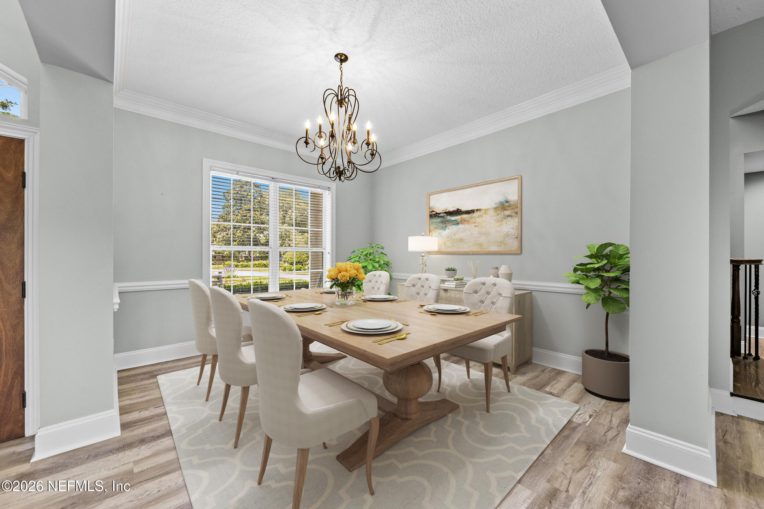 3225 Bishop Estates Road St. Johns, FL 32259 - Photo 12 of 90 a view of a dining room with furniture window and wooden floor