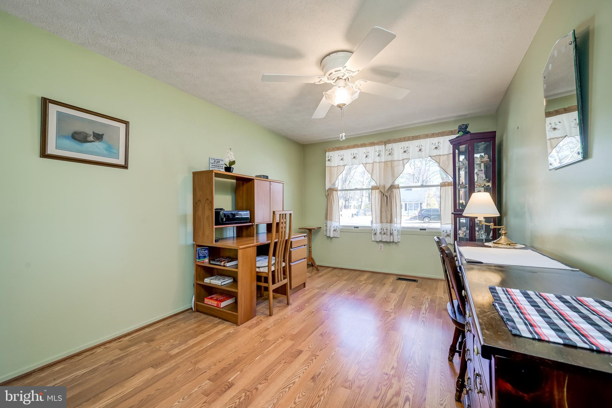 7179 Harp String Columbia, MD 21045 - Photo 16 of 27 a view of a livingroom with furniture and a window