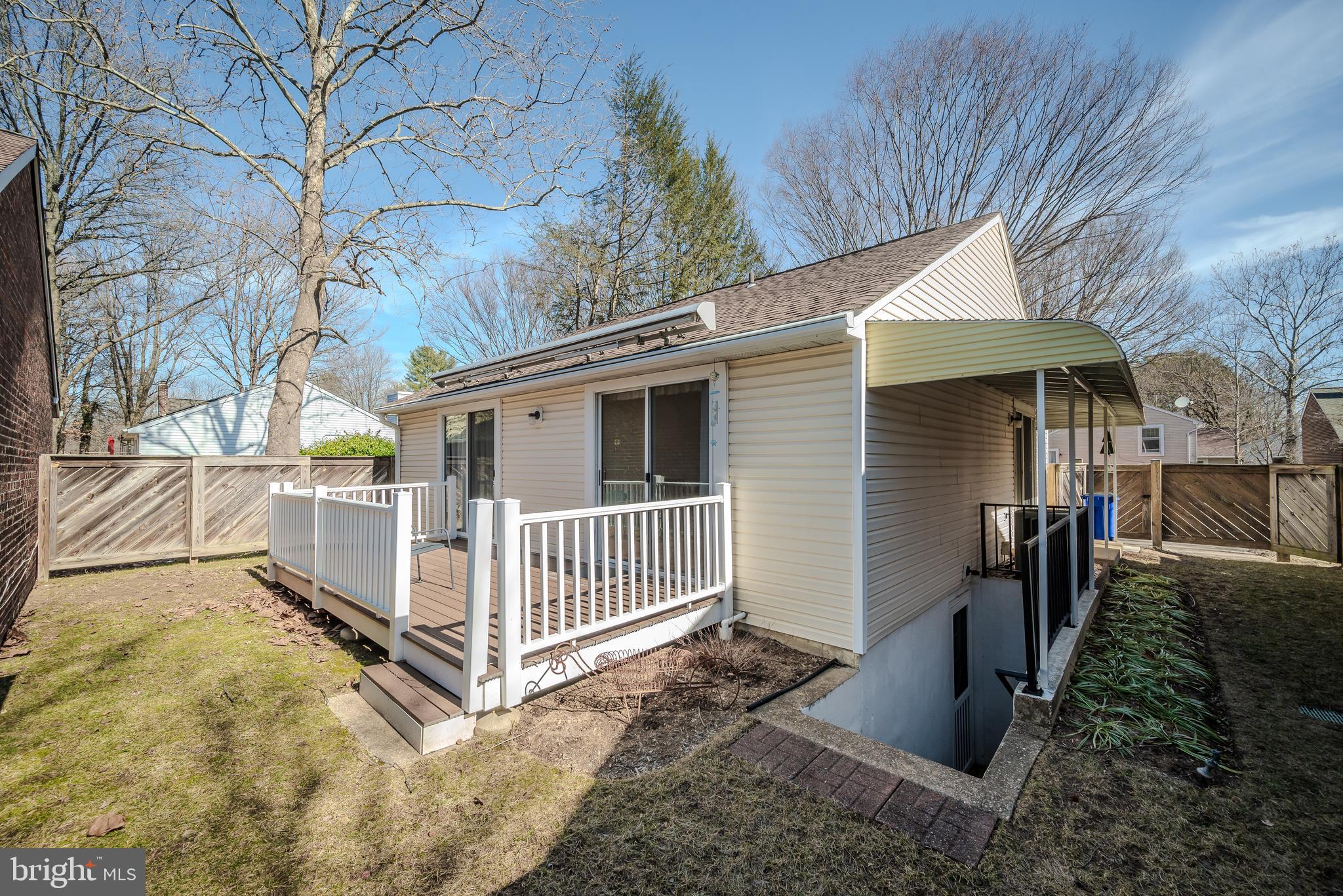 7179 Harp String Columbia, MD 21045 - Photo 25 of 27 a view of a house with backyard and trees