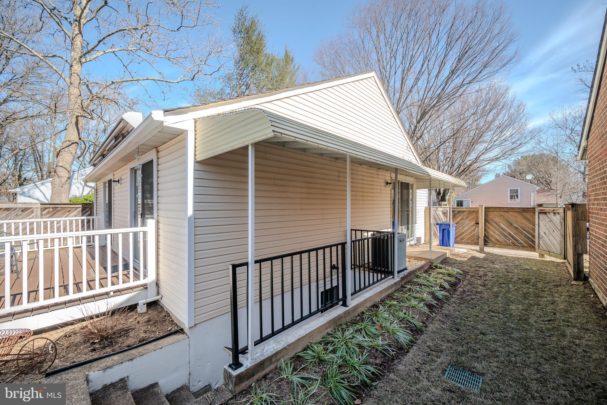 7179 Harp String Columbia, MD 21045 - Photo 27 of 27 a view of a house with wooden fence