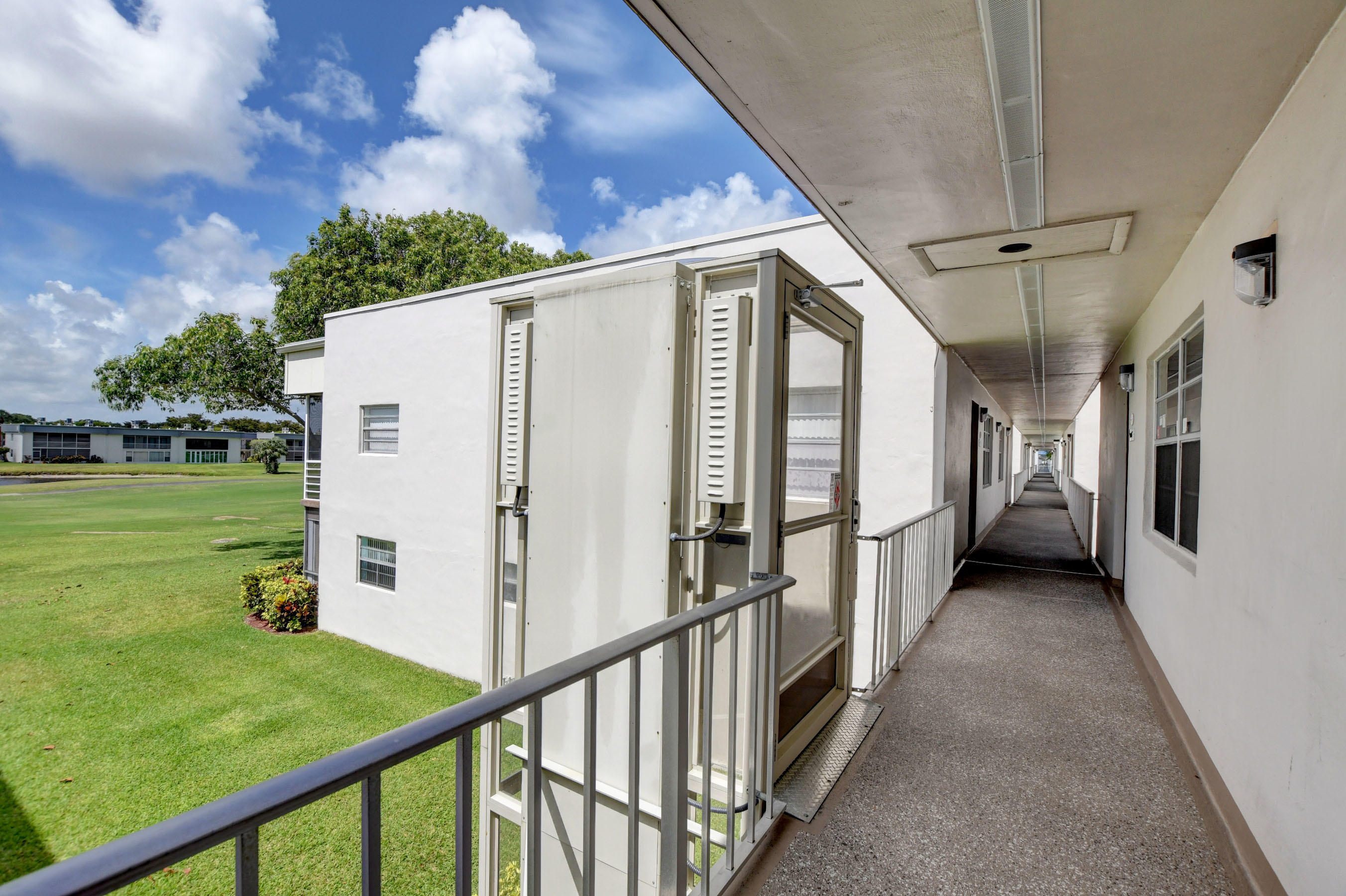183 Normandy Lane Delray Beach, FL 33484 - Photo 2 of 37 Elevator next to condo