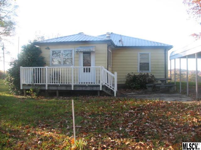 5792 Smith Road Vale, NC 28168 - Photo 11 of 14 a house view with a garden space