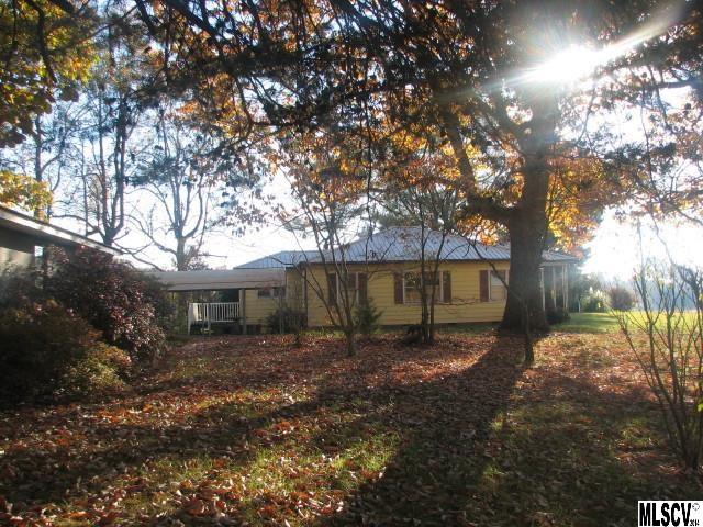 5792 Smith Road Vale, NC 28168 - Photo 7 of 14 a view of a yard with a tree