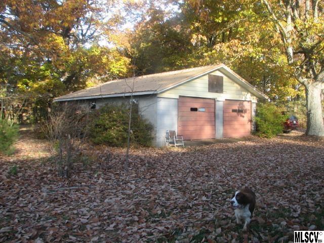 5792 Smith Road Vale, NC 28168 - Photo 10 of 14 a front view of a house with garden