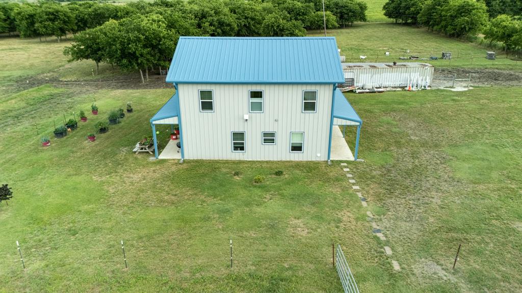 124 County Road 4511 Decatur, TX 76234 - Photo 37 of 39 a view of a house with a yard