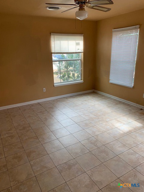 1205 Florence Road Killeen, TX 76541 - Photo 9 of 15 an empty room with windows
