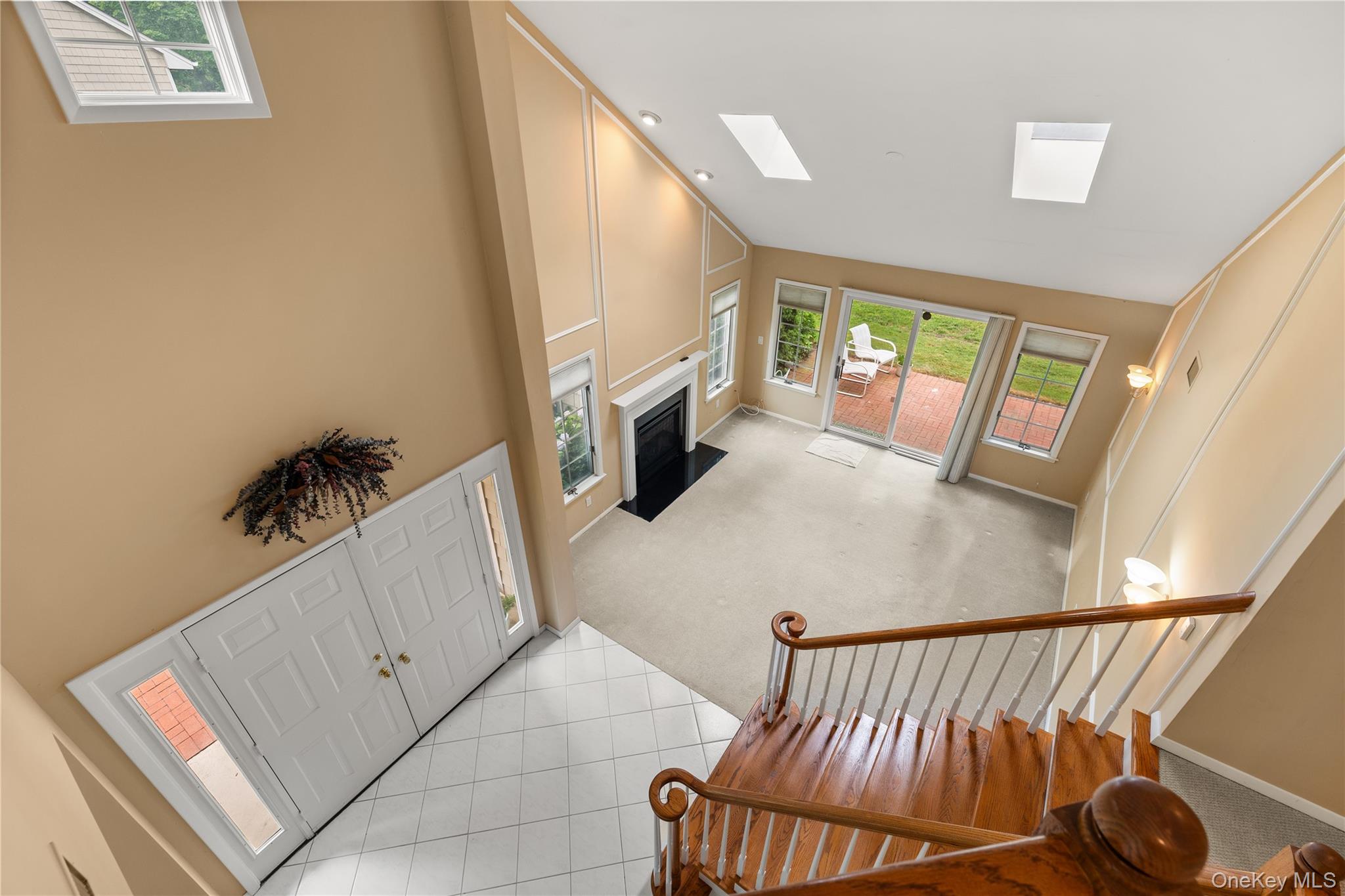 34 Cedar Ridge Lane Bay Shore, NY 11706 - Photo 14 of 27 a living room with furniture and a flat screen tv