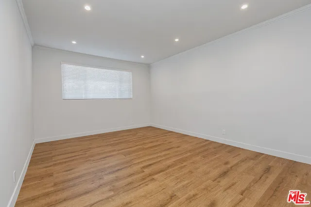 a bathroom with a granite countertop sink mirror and double