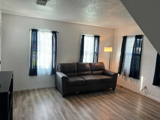 5627 Avenue R Galveston, TX 77551 - Photo 11 of 31 Living room 2nd floor