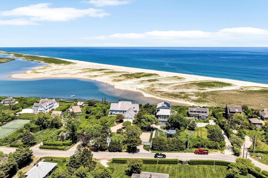 1 Carver Road Brewster, MA 02631 - Photo 1 of 33 a view of an ocean and beach