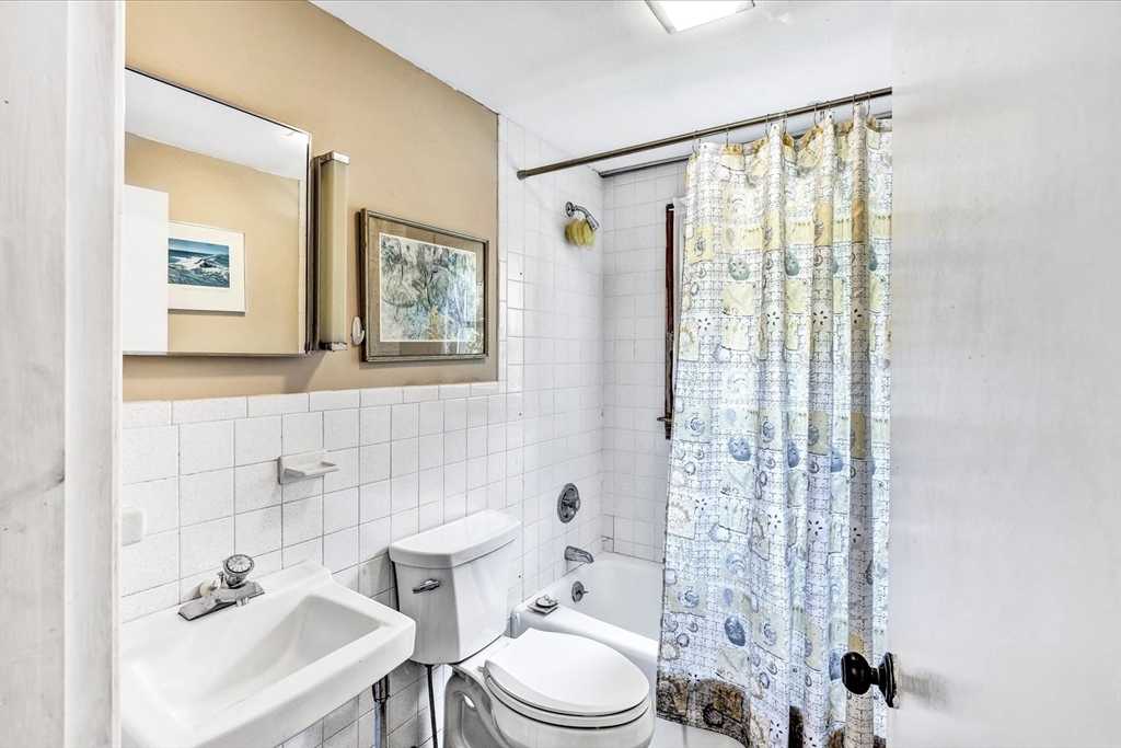 1 Carver Road Brewster, MA 02631 - Photo 18 of 33 a bathroom with a sink toilet and shower