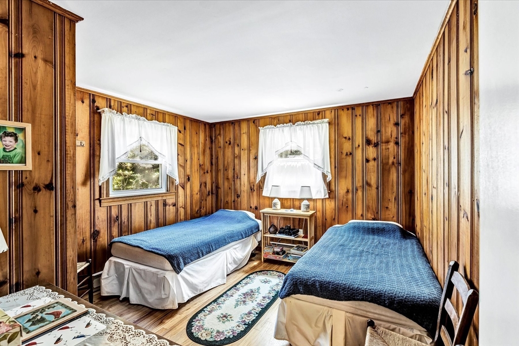 1 Carver Road Brewster, MA 02631 - Photo 19 of 33 a bedroom with two beds and next to a window