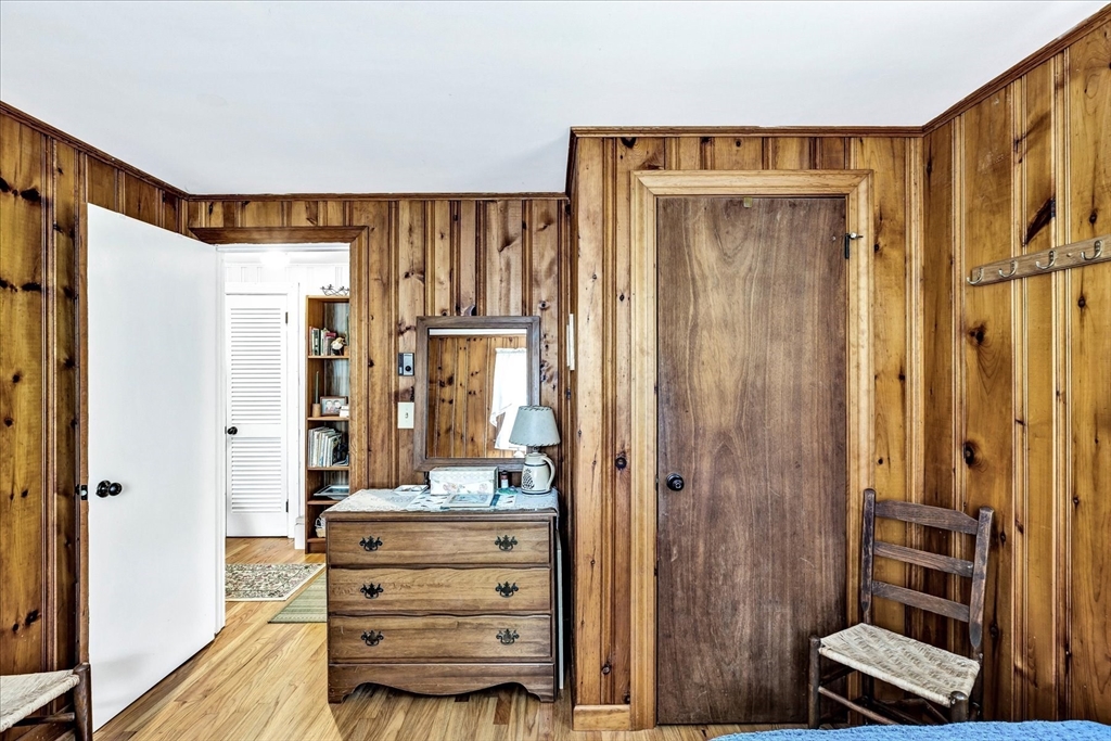 1 Carver Road Brewster, MA 02631 - Photo 20 of 33 a room with a dresser and a mirror