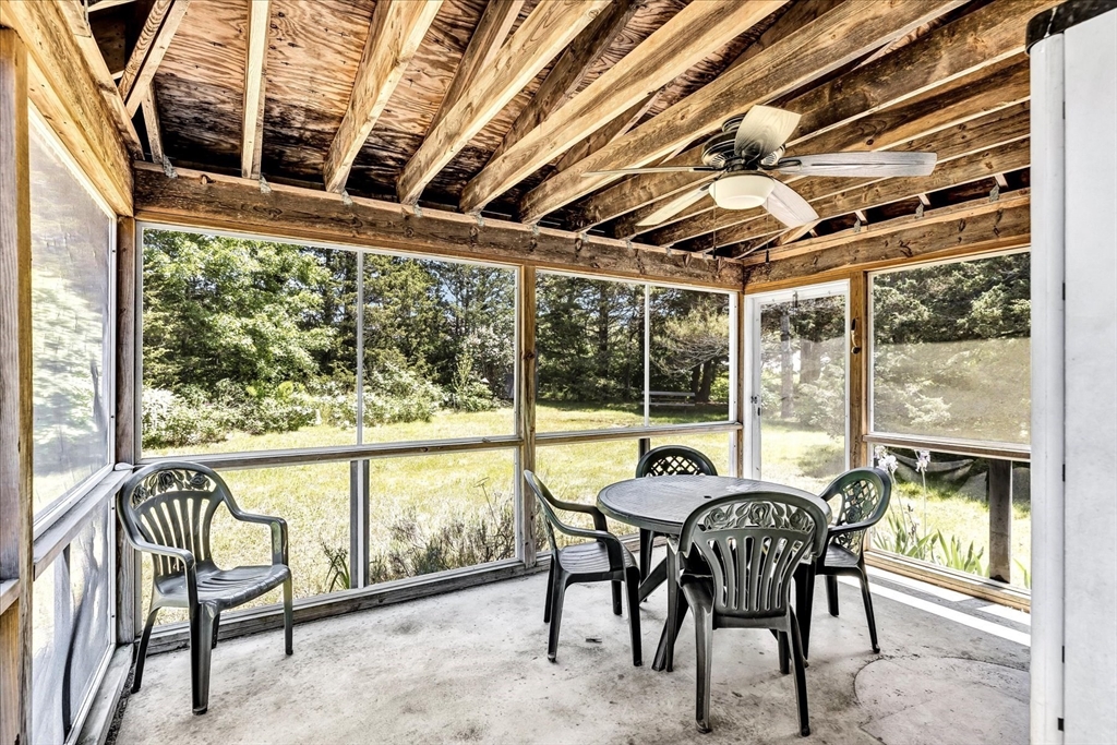 1 Carver Road Brewster, MA 02631 - Photo 8 of 33 a view of a chairs and table in the balcony