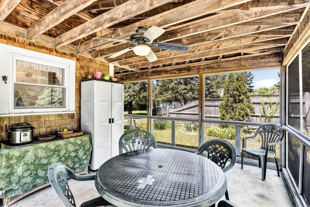 1 Carver Road Brewster, MA 02631 - Photo 9 of 33 a dining room with furniture and a table