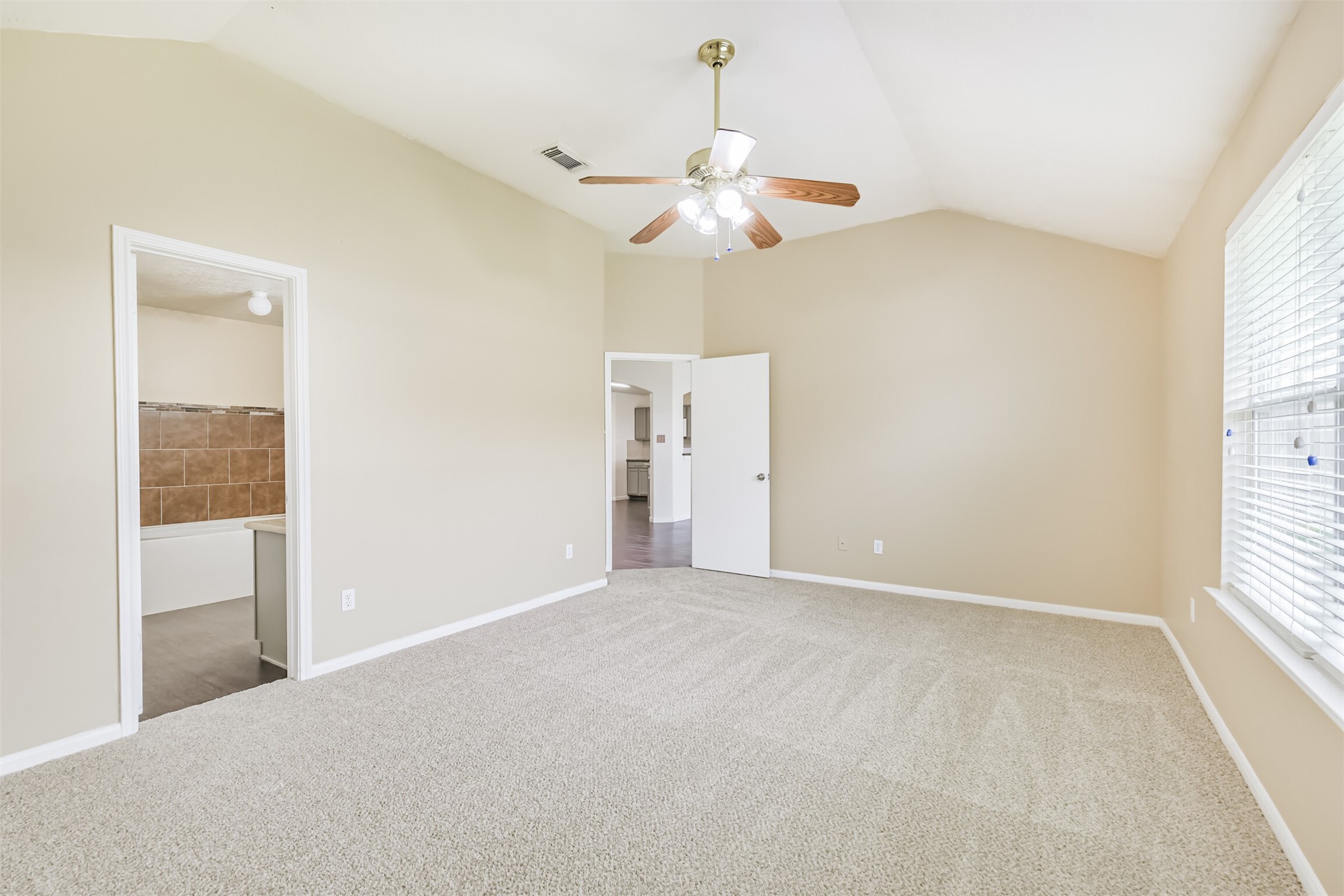 2415 Fox River Lane Spring, TX 77386 - Photo 18 of 34 a view of an empty room with a window
