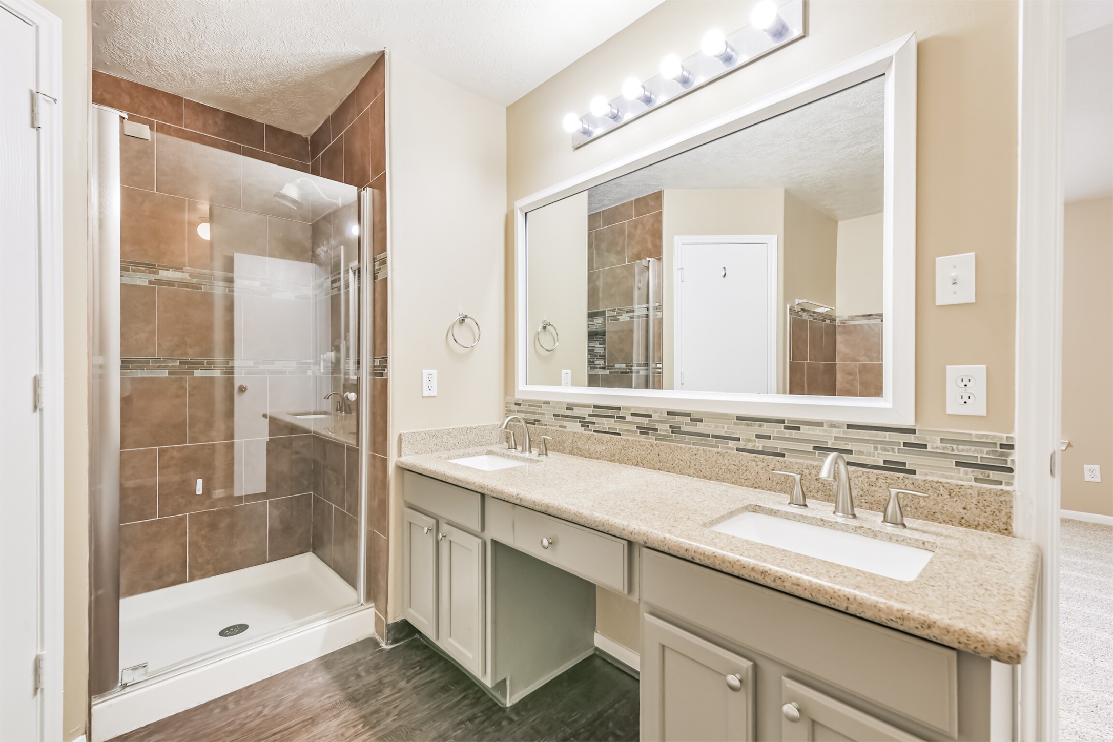 2415 Fox River Lane Spring, TX 77386 - Photo 20 of 34 a bathroom with a sink and a mirror
