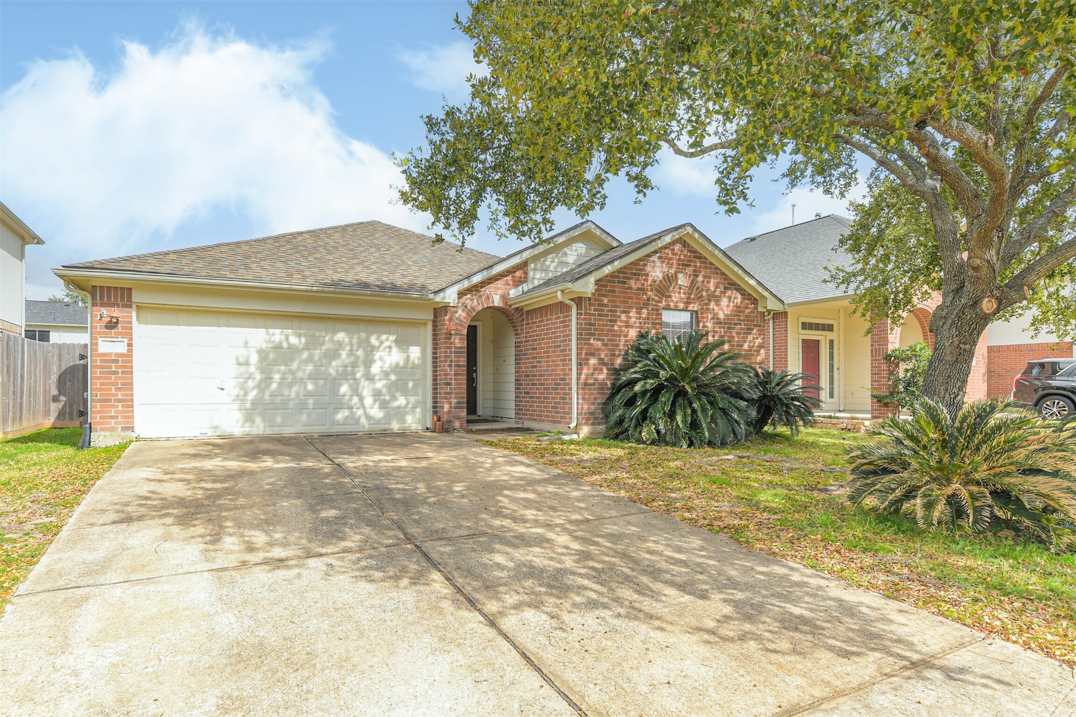 2415 Fox River Lane Spring, TX 77386 - Photo 2 of 34 a front view of a house with garden