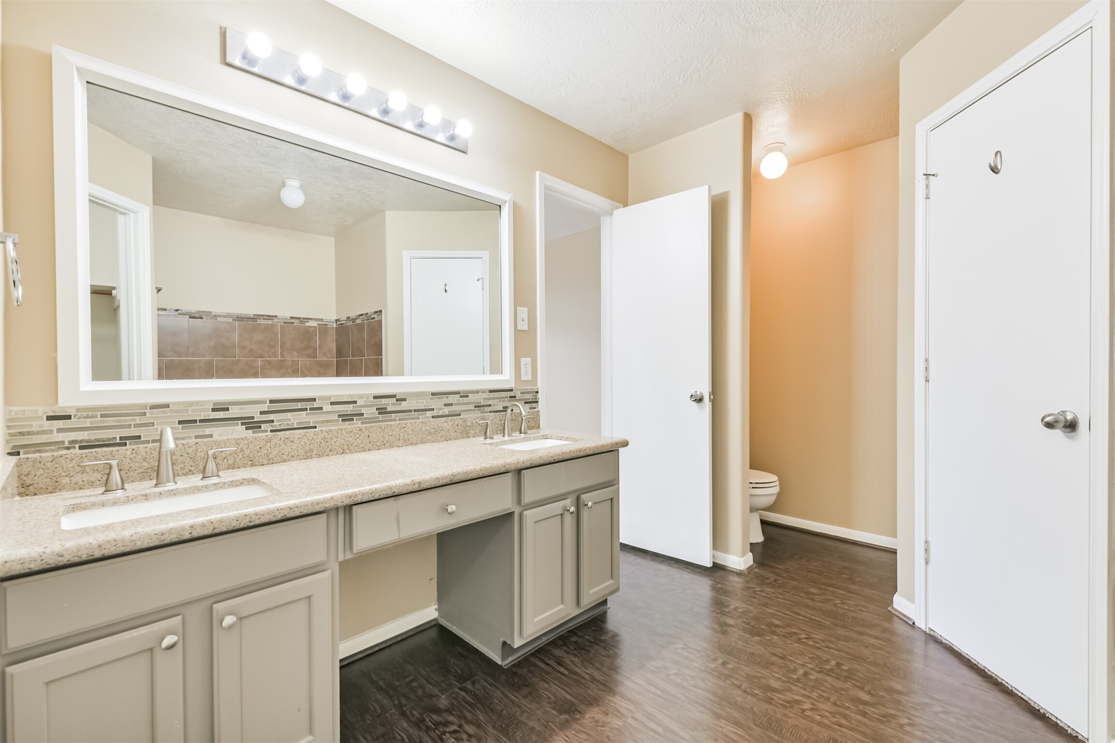 2415 Fox River Lane Spring, TX 77386 - Photo 22 of 34 a bathroom with a double vanity sink mirror and double