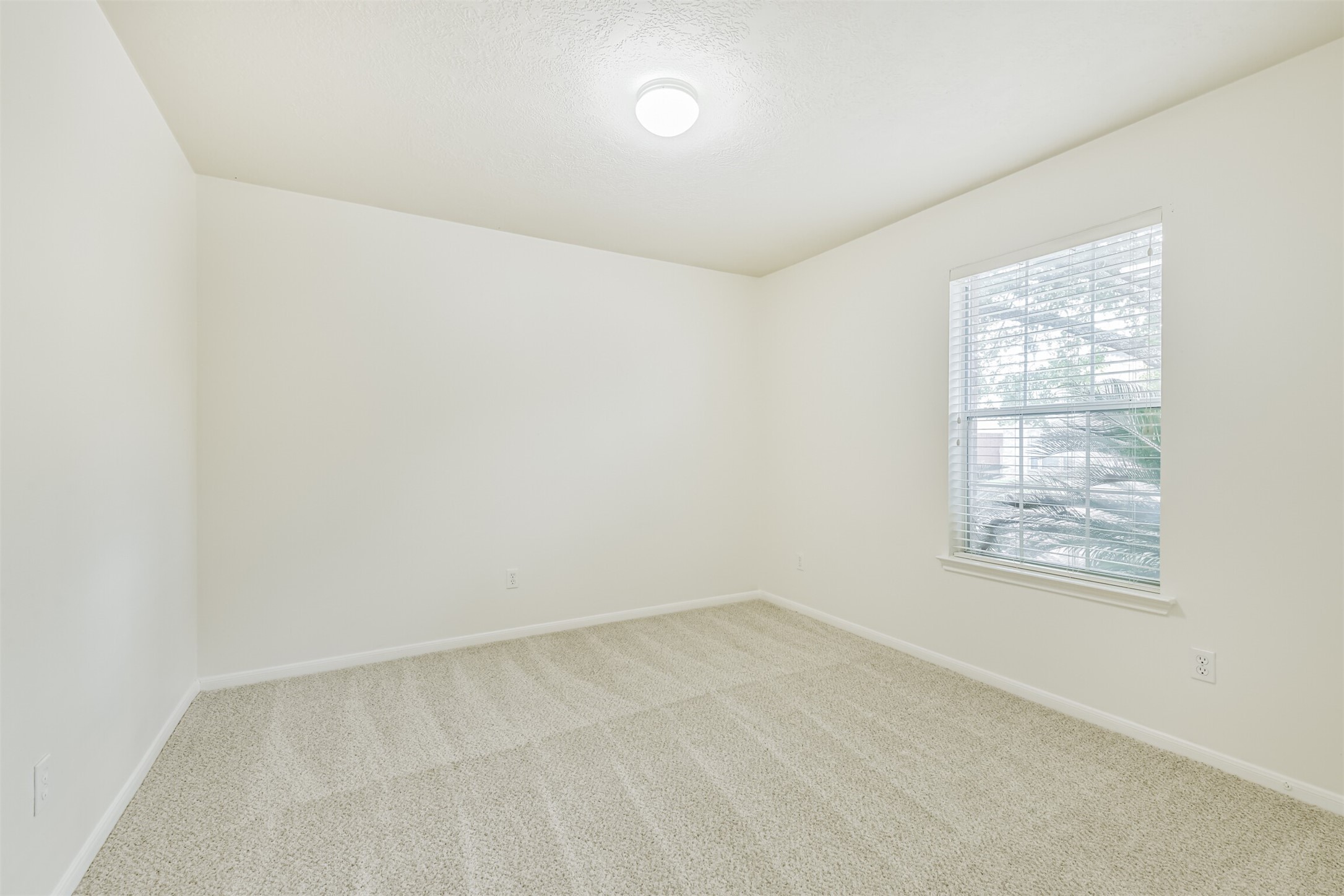 2415 Fox River Lane Spring, TX 77386 - Photo 25 of 34 an empty room with a window