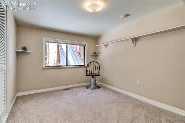 1824 Ridgeway Avenue Colorado Springs, CO 80906 - Photo 16 of 19 Second bedroom towards backyard