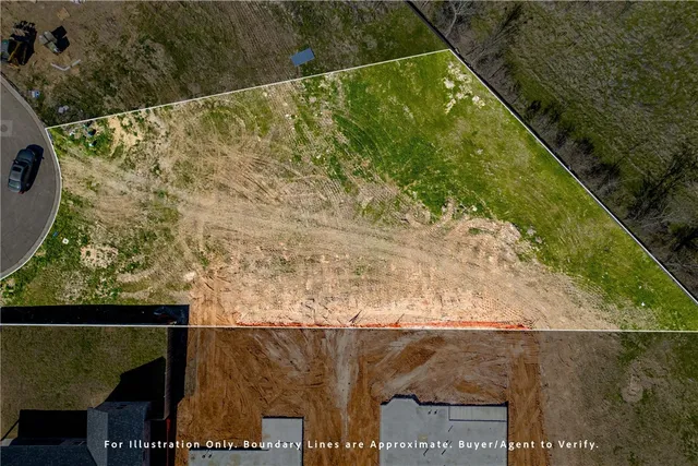 a view of swimming pool with a yard in back