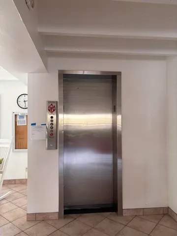 a view of a building and a street