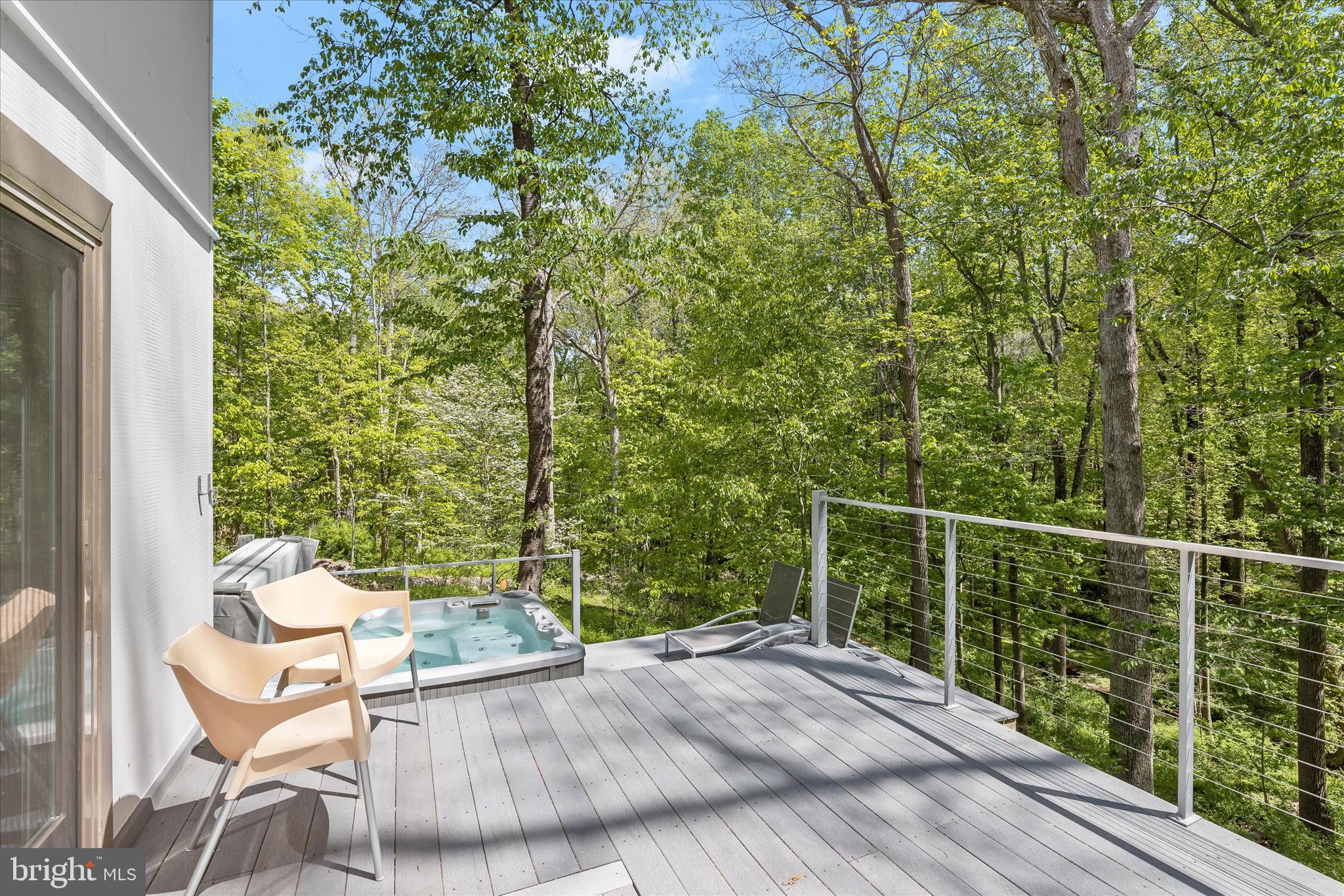 927 Buckhorn Road Sykesville, MD 21784 - Photo 64 of 147 a view of a balcony with chair and wooden floor