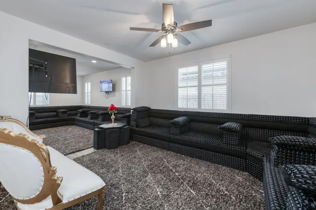 a kitchen with kitchen island granite countertop a counter space stainless steel appliances and cabinets