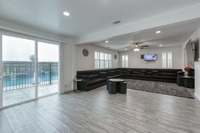 a living room with furniture and a window