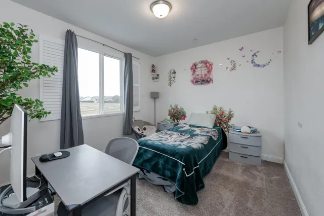 a view of a balcony with staircase