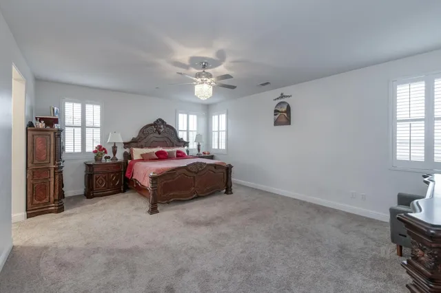 swimming pool view with a garden space