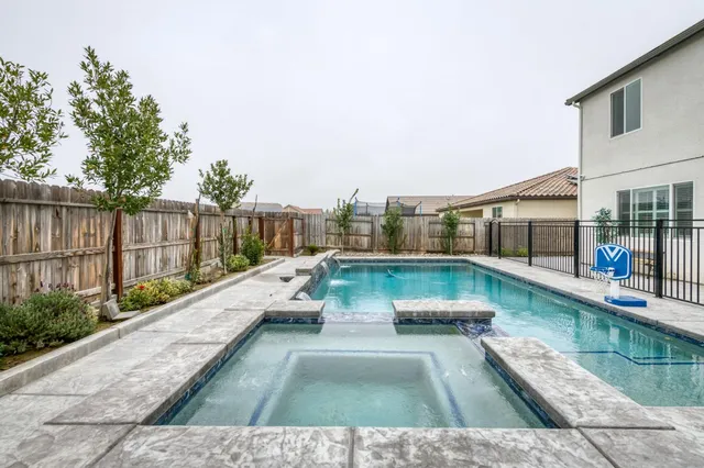 a view of swimming pool from a balcony