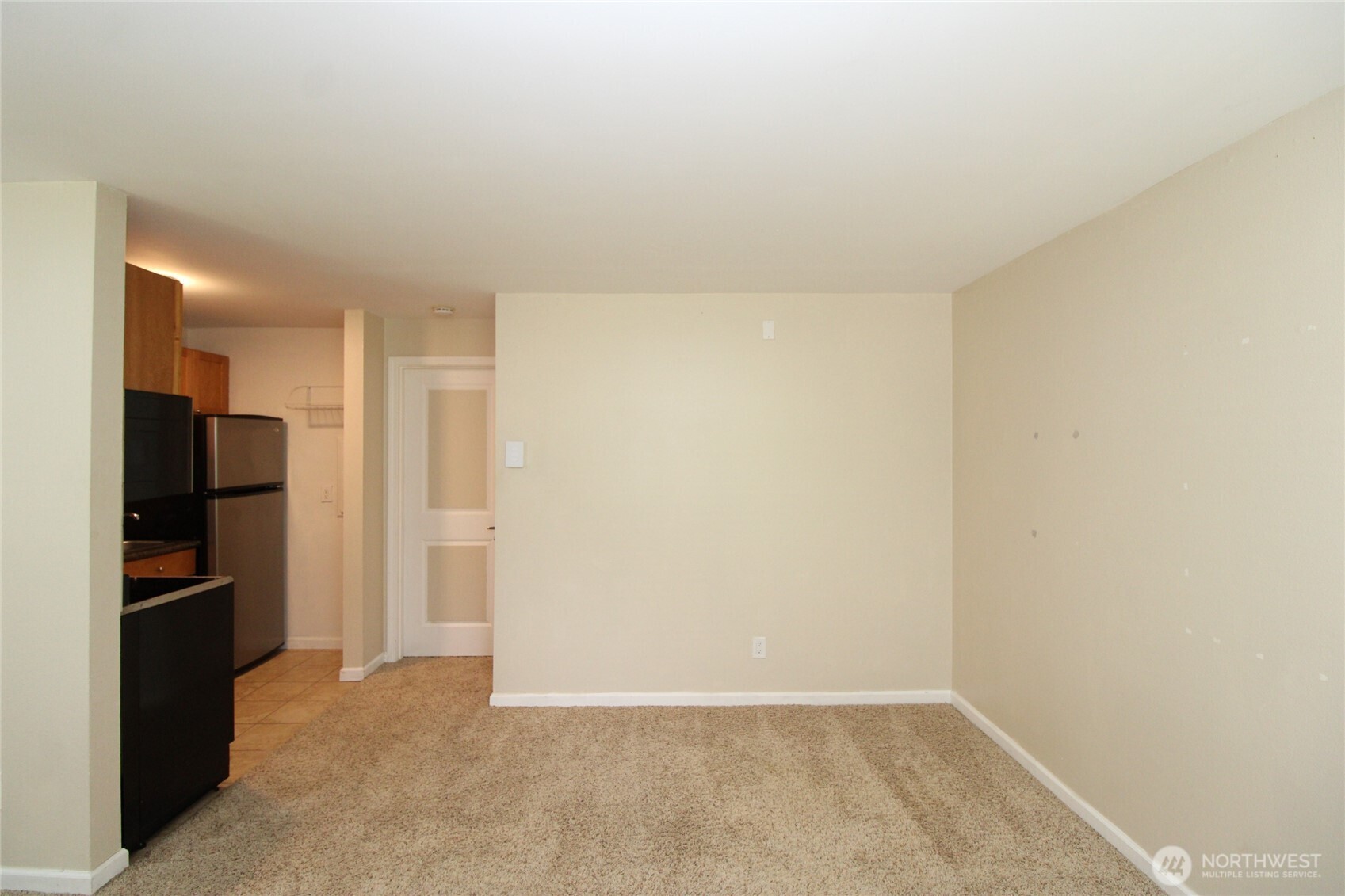 604 North 3rd Street, Unit 7 Tacoma, WA 98403 - Photo 5 of 12 a view of an empty room