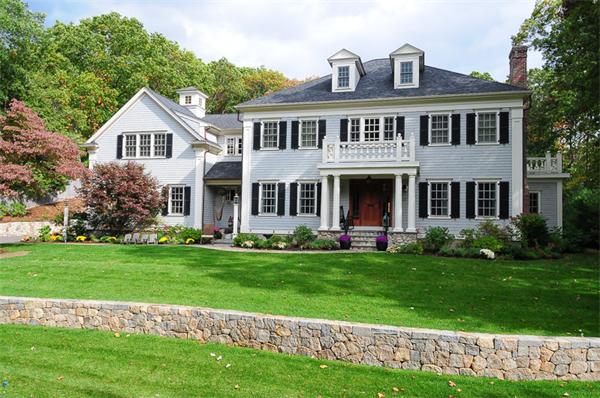 23 Suffolk Road Wellesley, MA 02481 - Photo 1 of 26 a front view of a house with a garden
