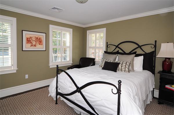 23 Suffolk Road Wellesley, MA 02481 - Photo 20 of 26 a bedroom with a bed and a window