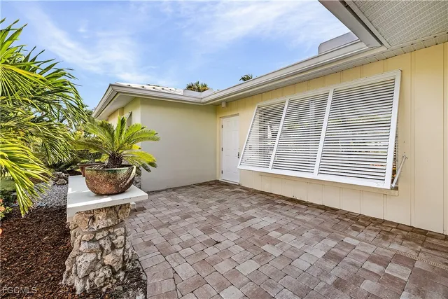 a view of a porch with a bench