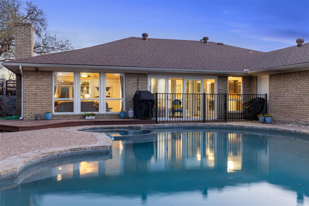 a view of a house with swimming pool