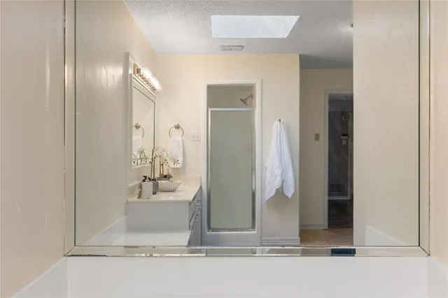 a bathroom with a double vanity sink