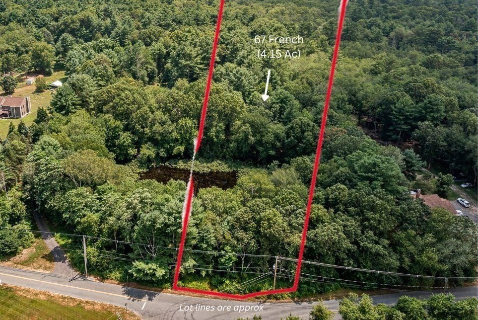 67 Wheeler Street Rehoboth, MA 02769 - Photo 2 of 5 a backyard of a house with lots of green space and plants