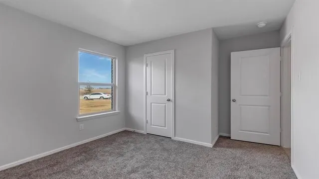 a bathroom with a granite countertop sink and vanity