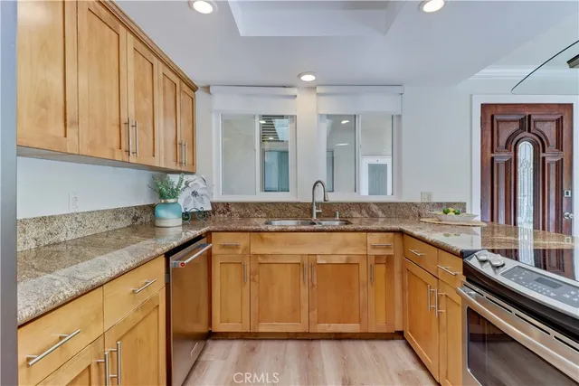 a kitchen with a table and chairs in it