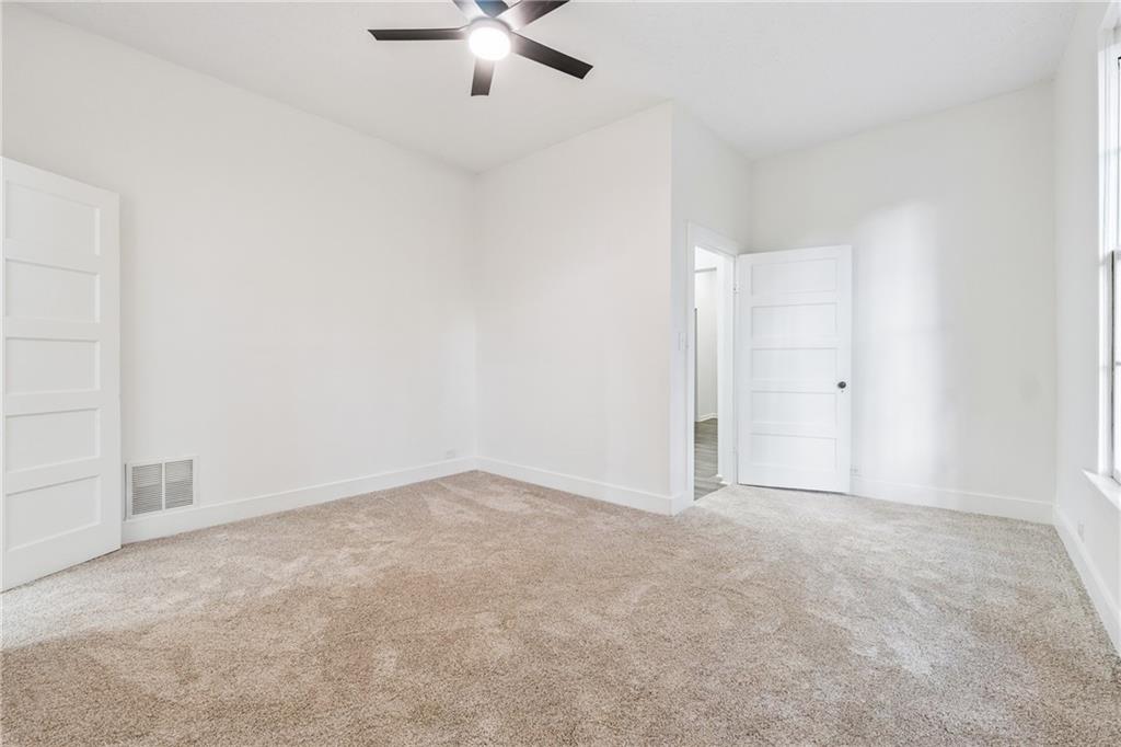 1820 Cassville Road Northwest Cartersville, GA 30121 - Photo 15 of 24 an empty room with chandelier fan