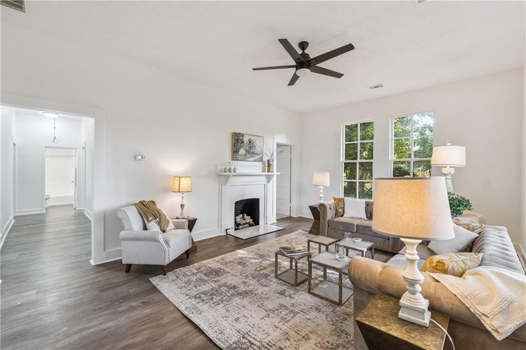 1820 Cassville Road Northwest Cartersville, GA 30121 - Photo 4 of 24 a living room with furniture or fireplace and a large window