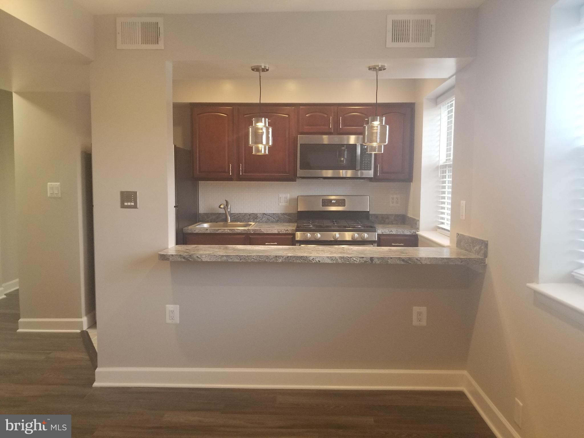 2647 Martin Luther King Jr Avenue Southeast, Unit 203 Washington, DC 20020 - Photo 6 of 28 a view of water heater room