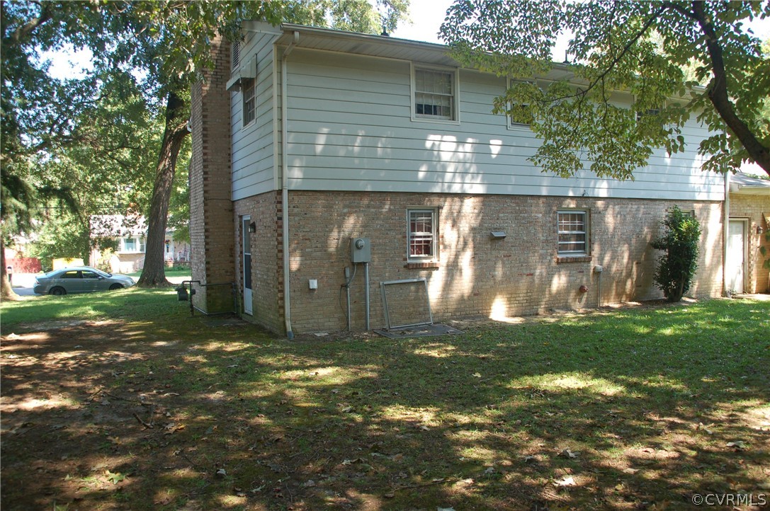 1213 Covington Road Colonial Heights, VA 23834 - Photo 5 of 33 a view of back yard of the house